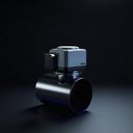 A compact motorized damper actuator on a short length of round metal duct, lit against a dark background.